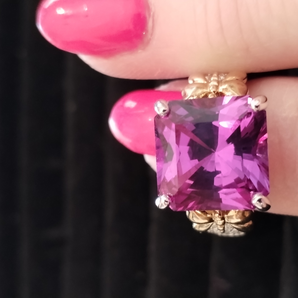 Stunning square simulated amethyst and set in a BUTTERFLY setting.